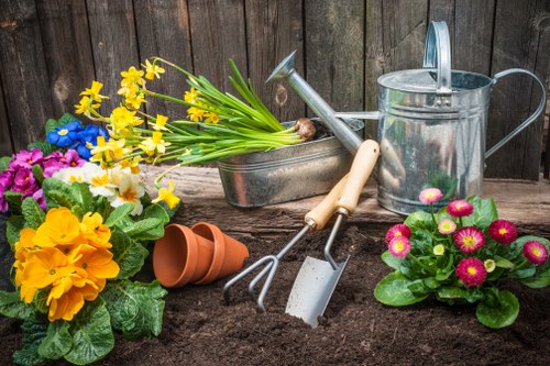 Team member preparing tools for garden maintenance