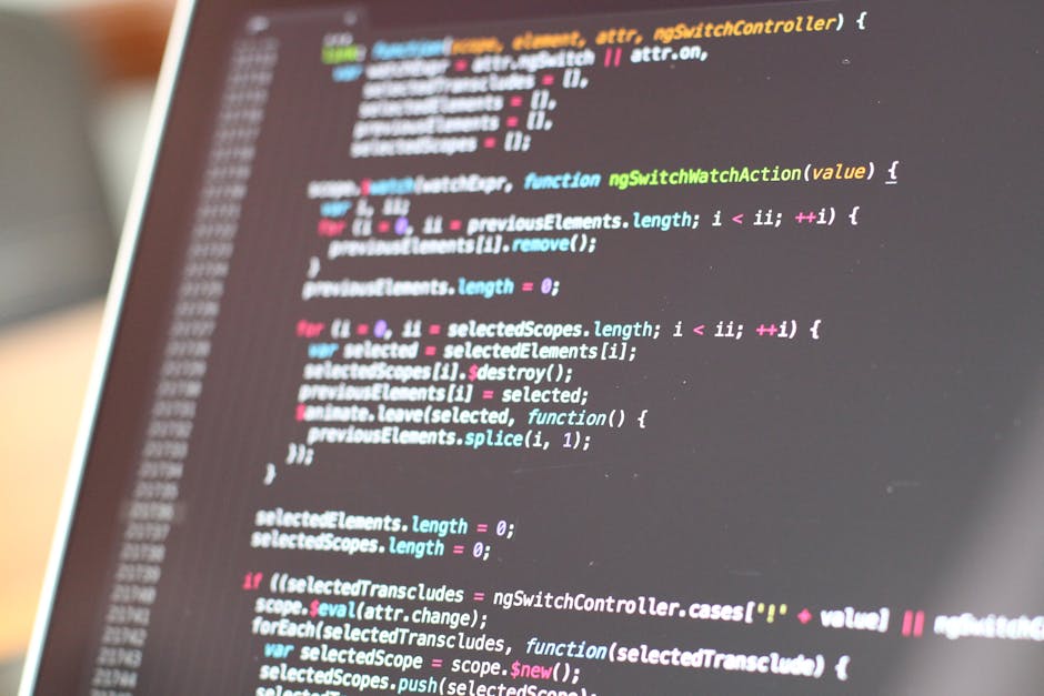 A detailed, close-up image of a computer screen displaying lines of HTML code in various colors, including tags, attributes, and text. The code appears to be part of a webpage's structure, with elemen